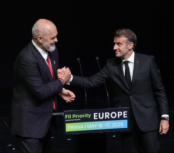 Leaders shaking hands at event